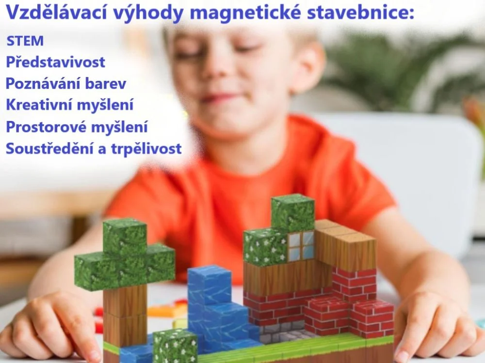 Vaikas prie stalo stato namus ir medžius iš magnetinių kaladėlių